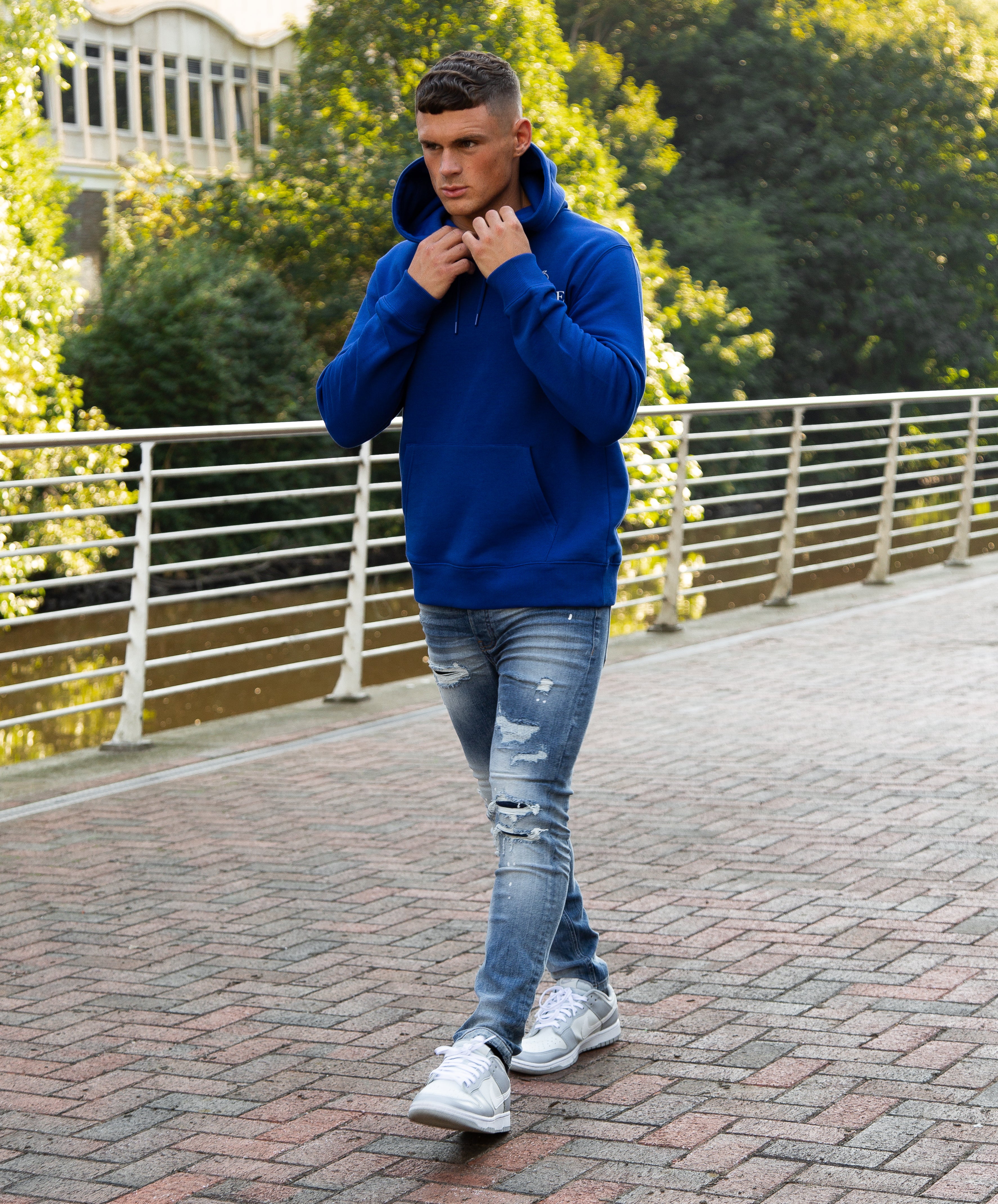 Blue hoodie and store jeans